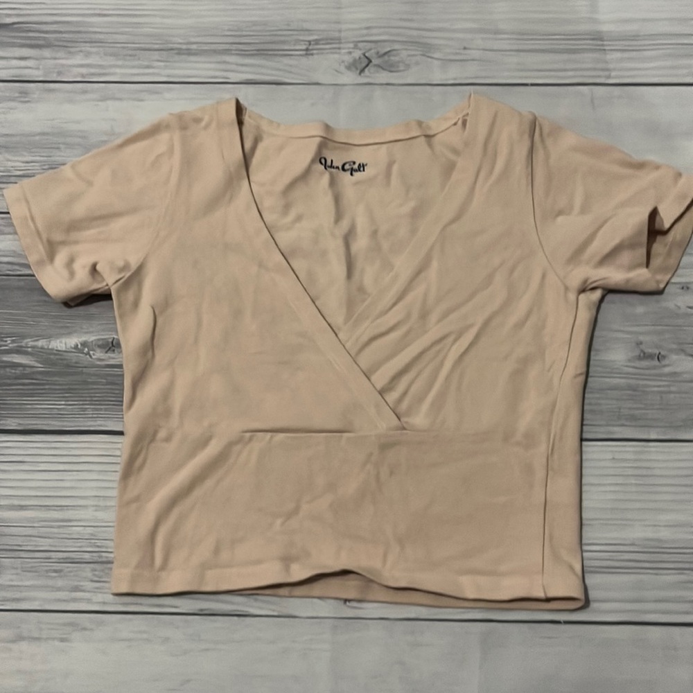 John Galt light pink baby tee
